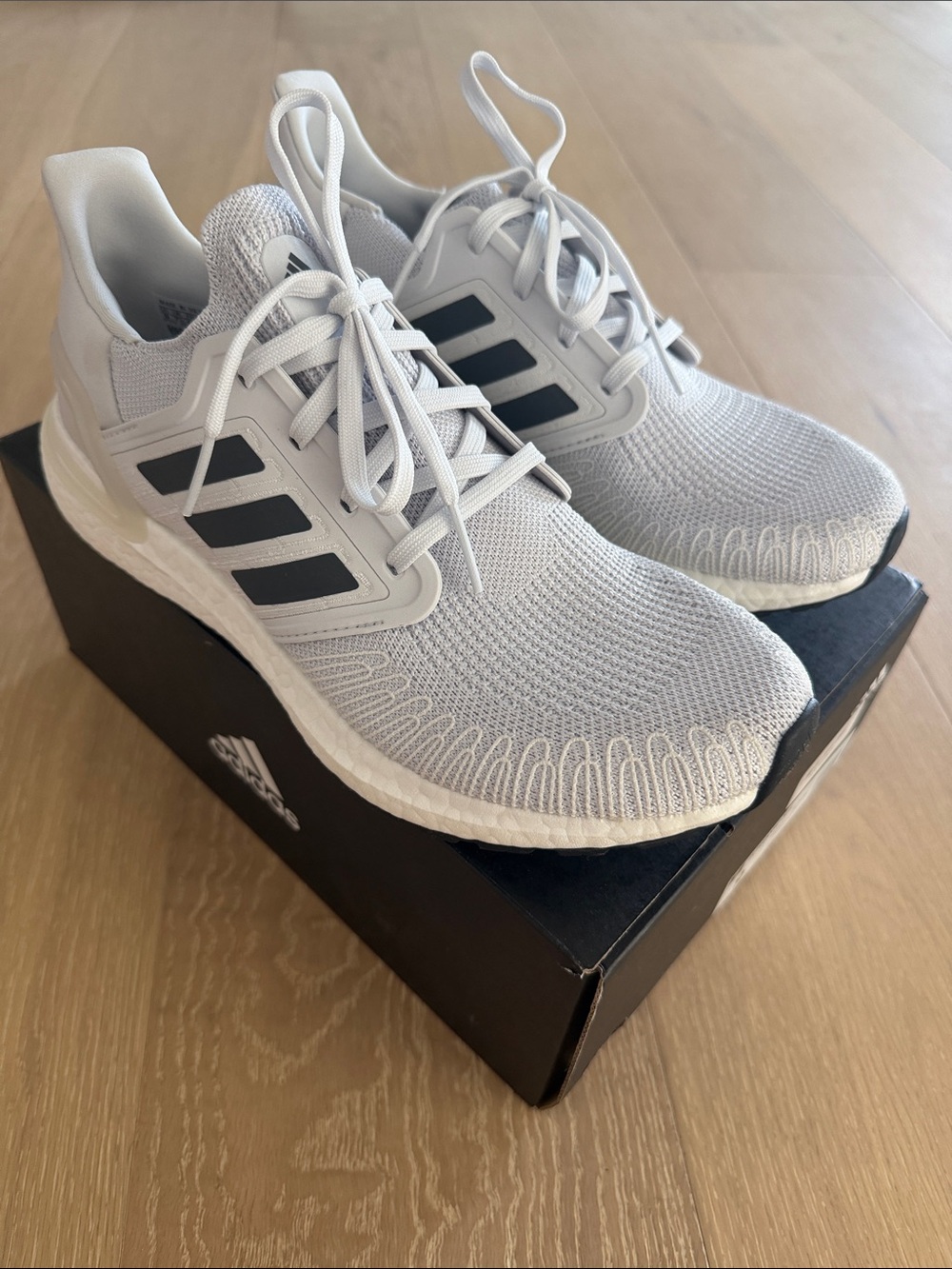 adidas women’s ultra boost 20 White Sneakers with Black Three-Stripes